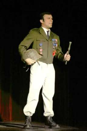 Richard Dean Prudenti as Mayor Steve Womack, returned from the war.