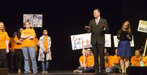 Rep. Steve Womack, played by Brantly Houston, tries to quiet the masses.